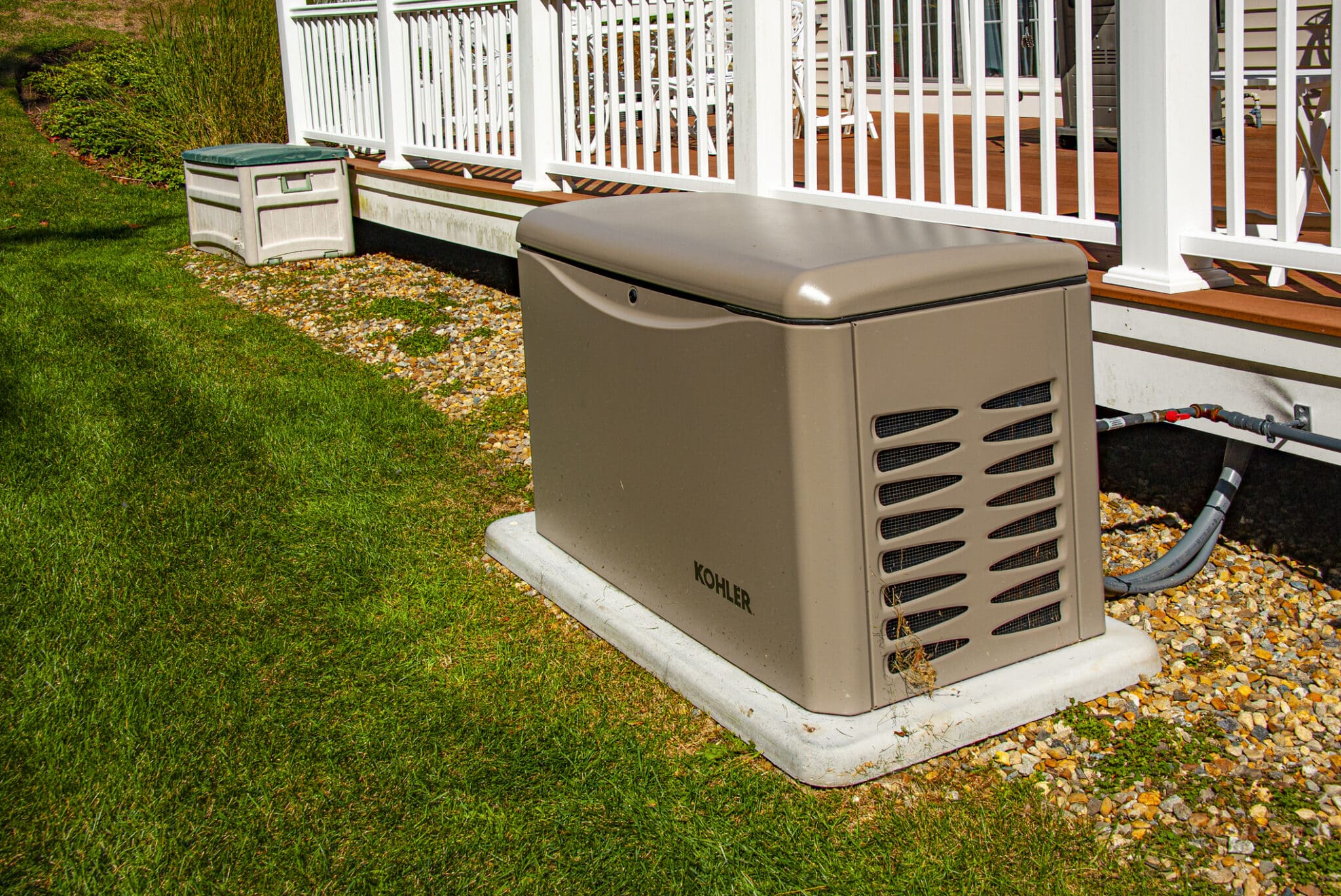 Residential standby generator on concrete pad